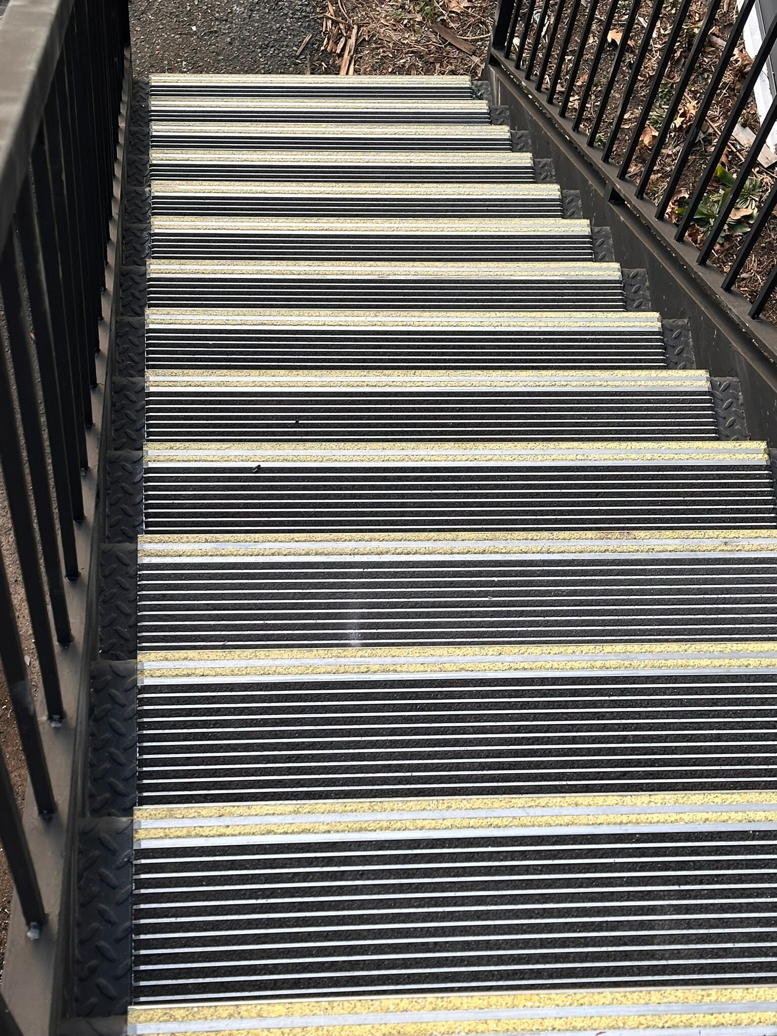 Each stair features “American Stair Treads” metal treads with safety grit strips for enhanced visibi - 328 High St