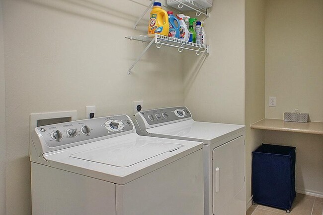 Laundry with storage closet - 13600 Breton Ridge St