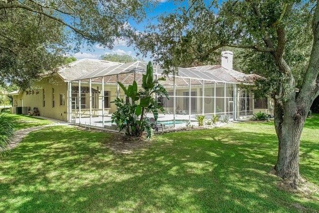 Building Photo - Stunning 5-Bedroom Pool Home on Nearly 2 A...