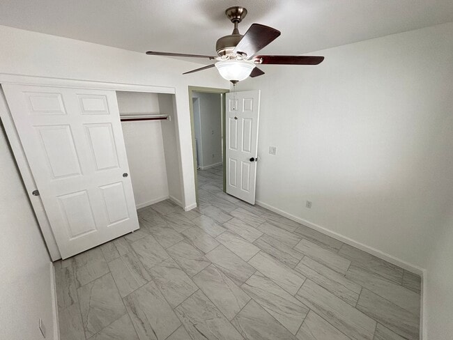 Building Photo - This inviting single-story home boasts a s...