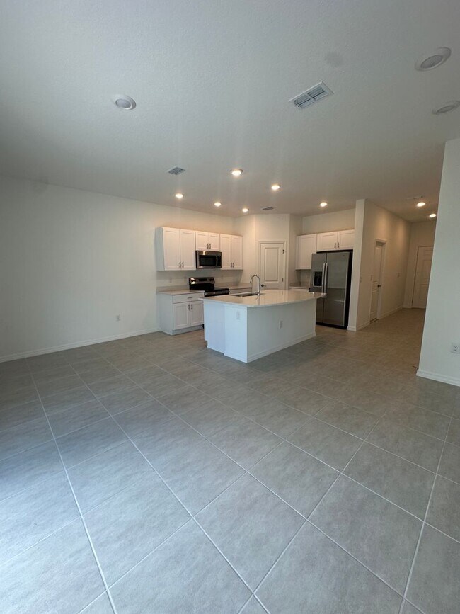 Building Photo - Brand New Townhome in Riverfront Community