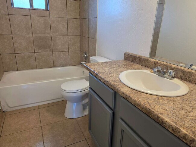 Building Photo - MOVE-IN READY 3 BEDROOM WITH $250 BONUS – ALL TILE & CENTRAL AIR OFFERING $250 GIFT CARE AFTER SU...