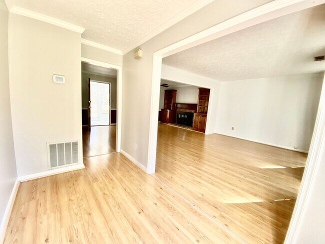 View from the front door to the family and living room from the foyer - 2160 Heritage Trace Ln