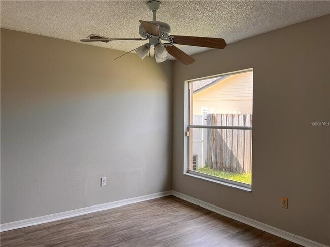 Building Photo - 8013 Gamboge Ct