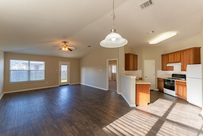 Building Photo - Charming Brick Home with Open Floorplan, Vaulted Ceilings, and Luxurious Amenities—Perfect for An...