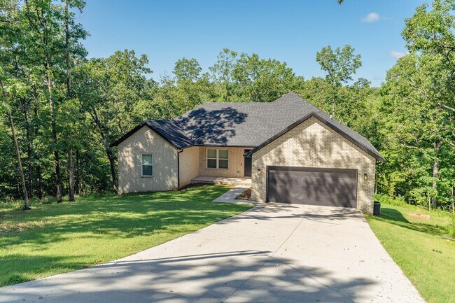 Building Photo - Nearly New Bella Vista Home Nestled in Ultimate Privacy! Furnished options available!