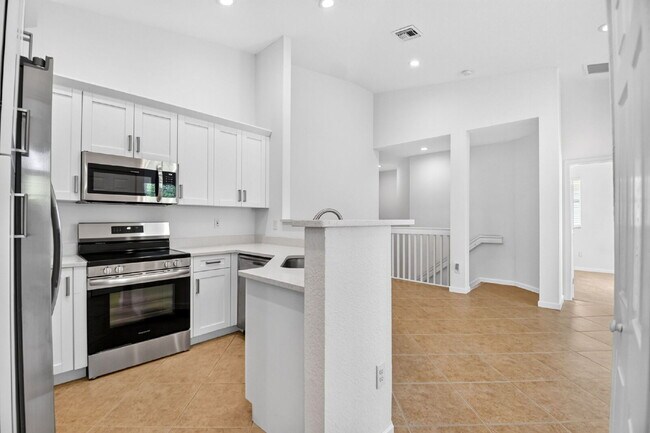 Building Photo - "Charming 2-Bed, 2-Bath Oasis in Riviera Beach – Your Perfect Retreat!"