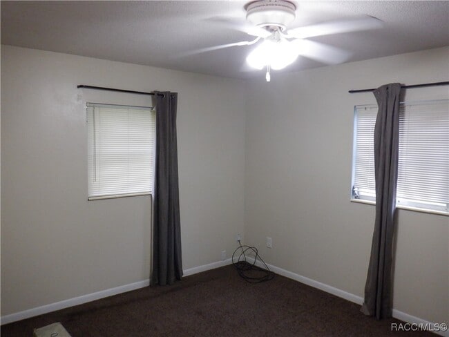 Building Photo - 9513 E Village Green Cir