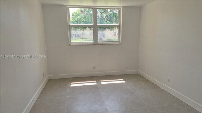 Building Photo - 6050 NW 64th Ave