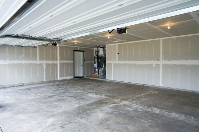 Building Photo - Newly built home with 3 car garage