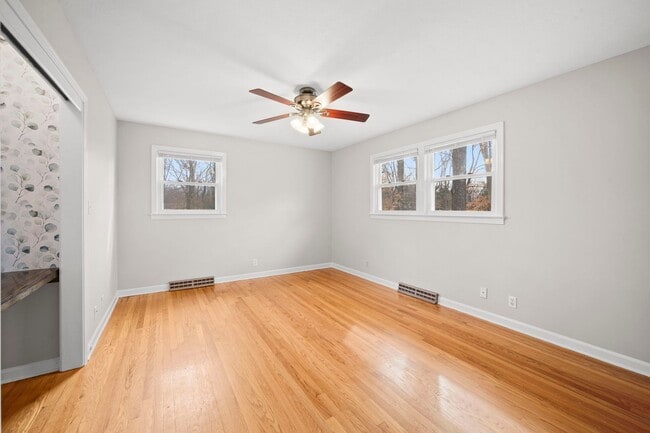 Building Photo - Spacious 4BR (or 3BR + Bonus) with 2 Living Rooms, Screened Porch & 4-Car Garage