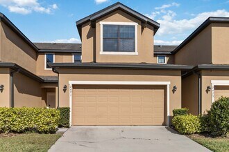 Building Photo - Bright & Stylish 3-Bedroom Townhome with Pond Views in Gated Seven Oaks