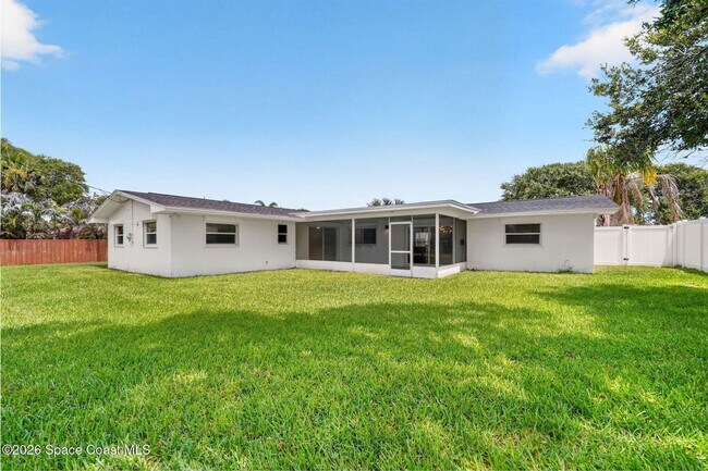 Building Photo - Welcome to this beautifully remodeled 4-bedroom, 3-bath home in the heart of Indialantic Beach!