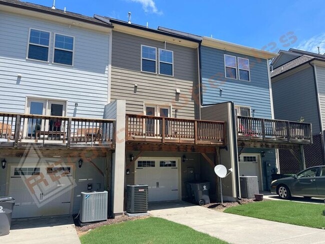 Building Photo - Lovely 3 Story 3 Bedroom 3.5 Bath 1 Car-Ga...