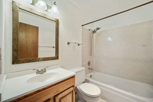 Building Photo - AVAILABLE NOW! 2BR/2BA Condo – Awesome Location! Glossy Hardwoods, Granite Countertops, W/S/G Inc...