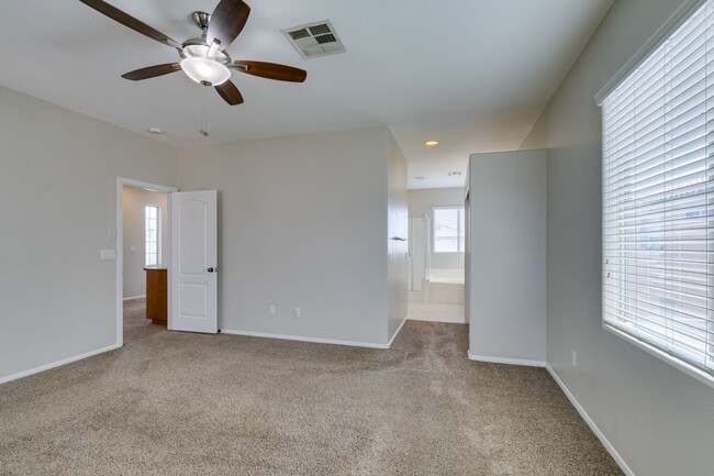 Building Photo - 9341 Colorful Rainbow Ave