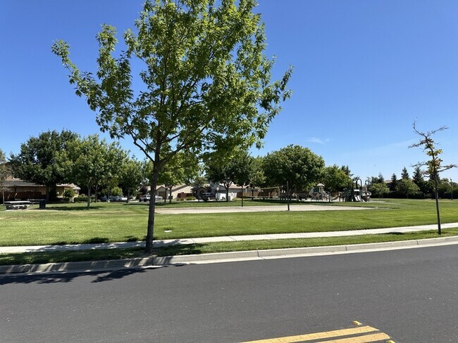 Building Photo - This stunning corner home offers 4 spaciou...