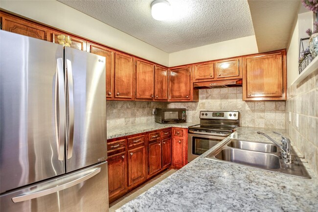 Primary Photo - Small gated community of 39 units, conveni...