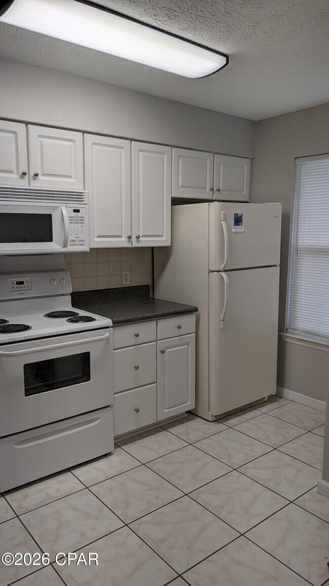 Building Photo - 7813 N Lagoon Dr