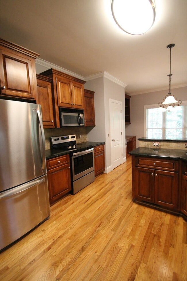 Building Photo - Exclusively Offered By Muse Realty Rentals, LLC