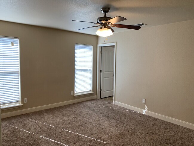 Building Photo - Solar Panels and Alarm System Included!!