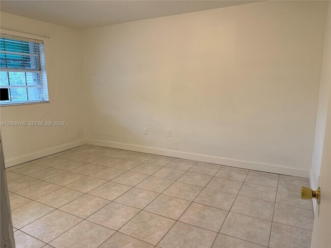 Building Photo - 12372 SW 52nd Ct