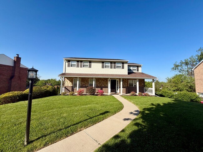 Building Photo - Modern Comforts Await: Spacious Rental with 2-Car Garage, Private Office, and Finished Basement w...