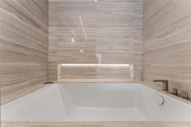 Building Photo - 18975 Collins Ave