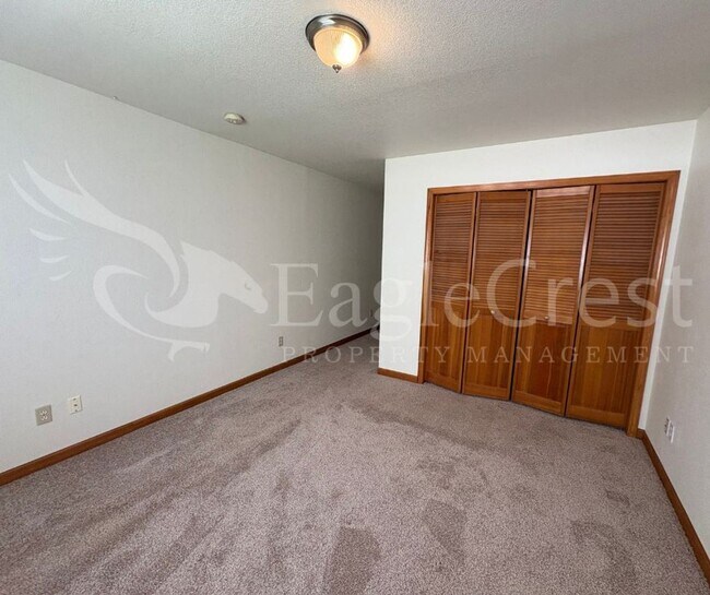 Building Photo - Three Bedroom, Two Bathroom House with Fenced Yard and Outdoor Fireplace