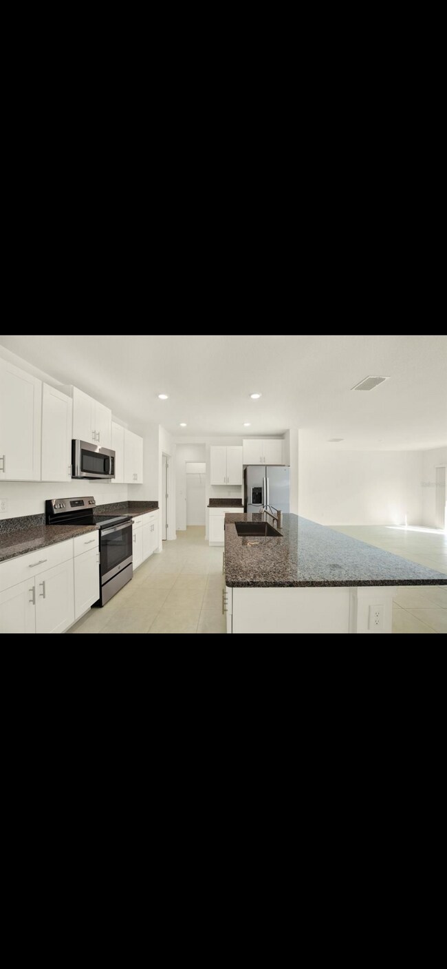 Building Photo - 6603 Back Forty Loop