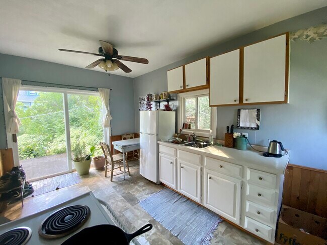 Kitchen w/access to the side deck - 1301 E 7th St