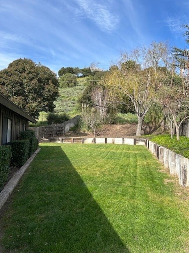 Building Photo - NEW PRICE – Move-In Ready Home with Expansive Yard & RV Parking