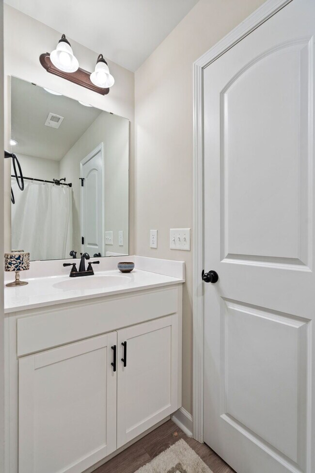 Building Photo - Available Now! Enjoy low-maintenance coastal living in this beautiful 2-bedroom, 2.5-bath townhom...