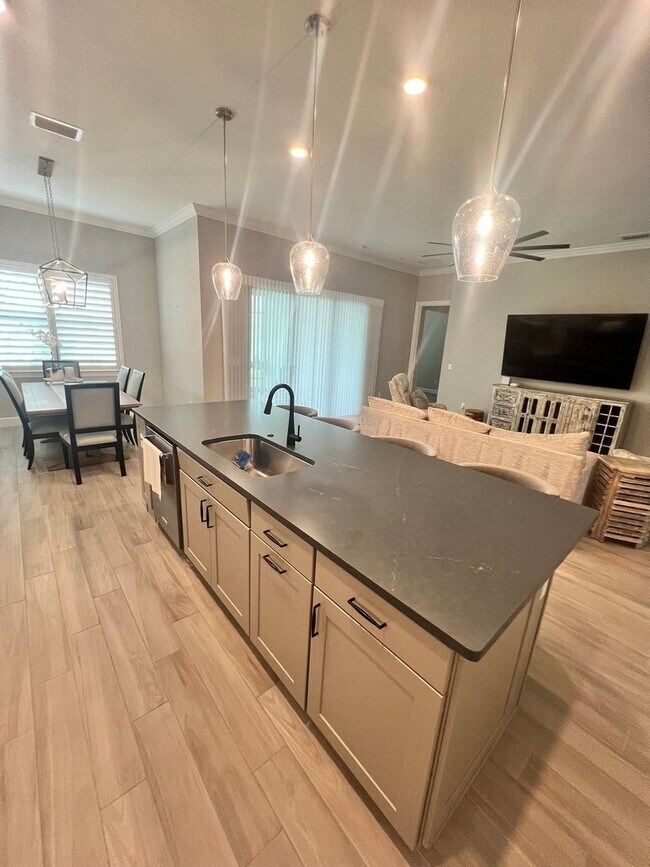 Building Photo - STUNNING LAKEFRONT 3 BEDROOM, 2.5 BATH HOM...
