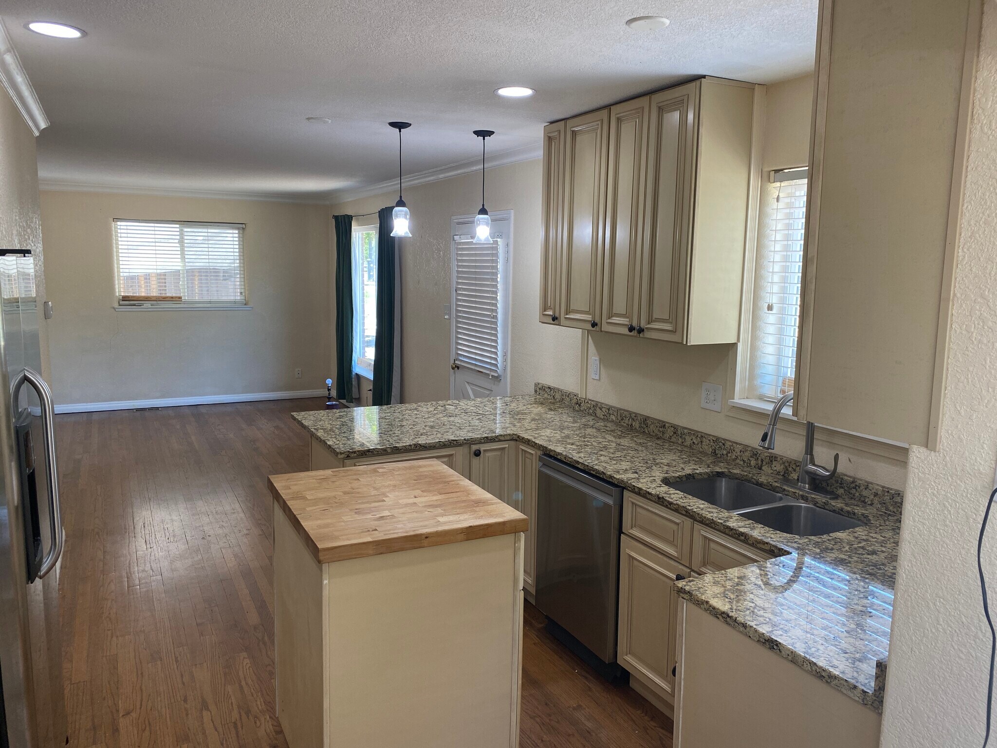 kitchen with island in middle 3 - 1690 Syracuse St