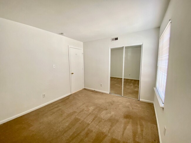 Building Photo - Spacious Condo One Mile to the Beach! One Living Level - Pet Friendly - Private Patio - Ready 05-...