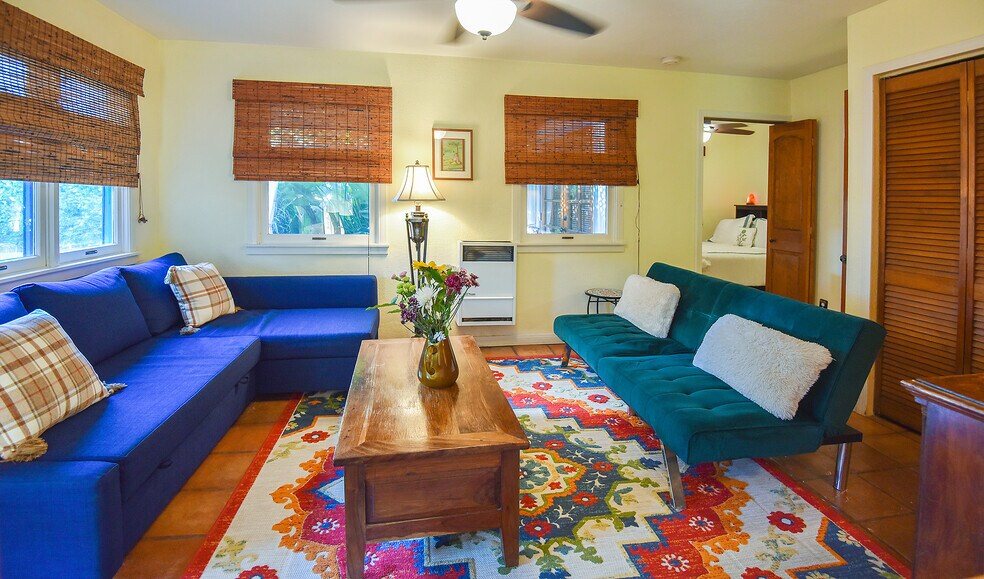 LIVING ROOM: Blue Sofa-Bed (left, queen), Green Sofa-Bed (right, full), bedroom (rear, right) - 14 S Venice Blvd