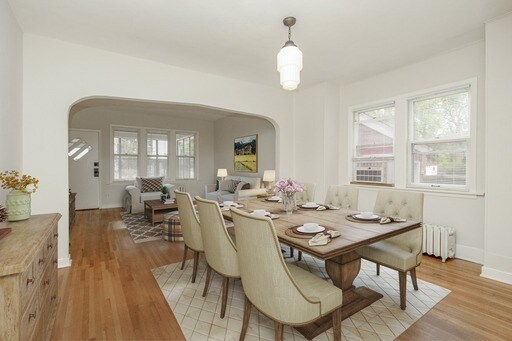 dining room into living room with attached front porch - 54 Pascal St S