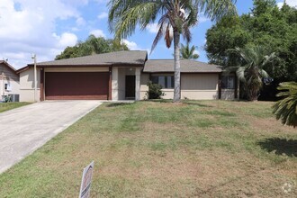 Building Photo - 3/2/2 Fence yard w/ shed and Florida room