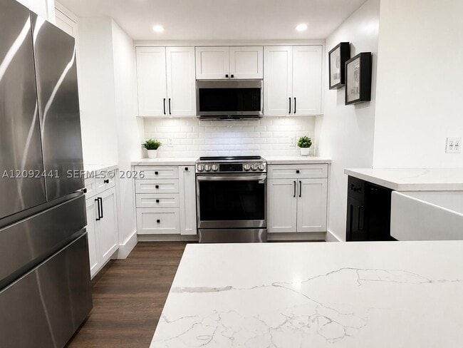 Building Photo - 8390 SW 72nd Ct