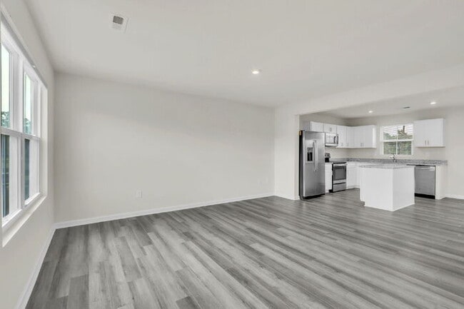 Building Photo - Modern 3BR Townhome with Bonus Room Near F...