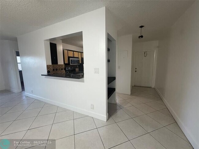 Building Photo - 12141 Royal Palm Blvd