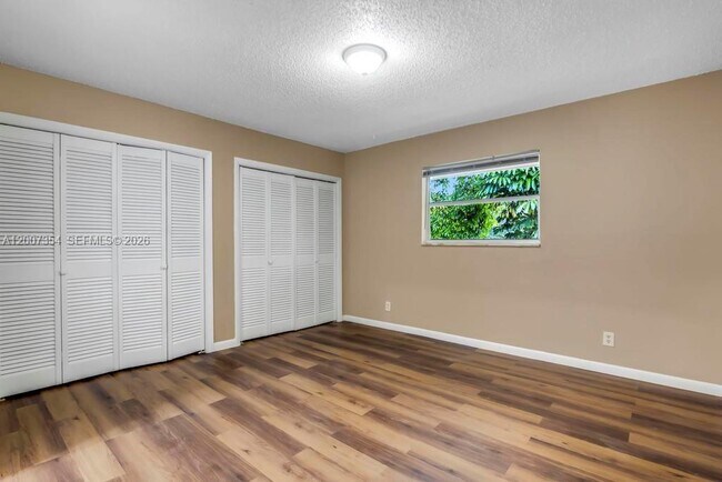 Building Photo - 3100 Coral Springs Dr