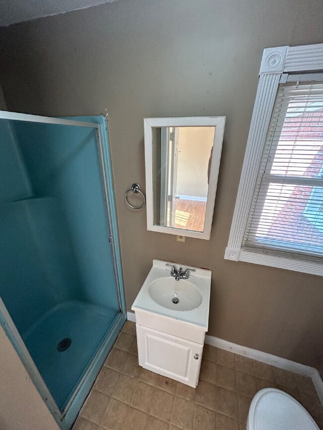 Building Photo - "Charming 4-Bedroom Home in Jonesboro with Cozy Fireplace & Gleaming Hardwood Floors!"