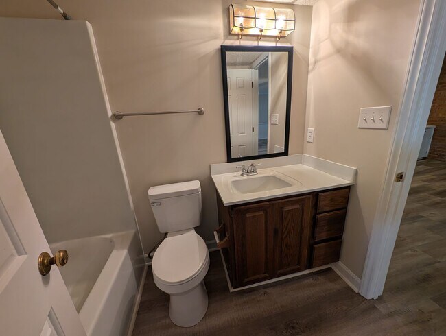 Building Photo - Gorgeous Brick 4 bedroom, 4 bathroom home located in the Farmwood community in Minthill!