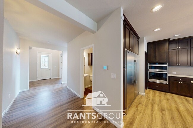 Building Photo - Luxury 4-Bedroom Home with 5-Car Garage & ...