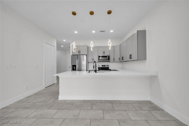 Building Photo - 4833-4835 Leonard Blvd S