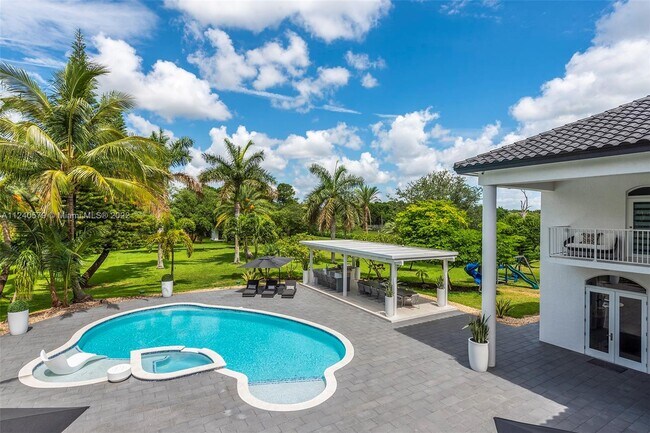 Building Photo - 5801 Melaleuca Rd