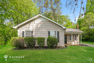 Building Photo - Inviting 4-Bedroom