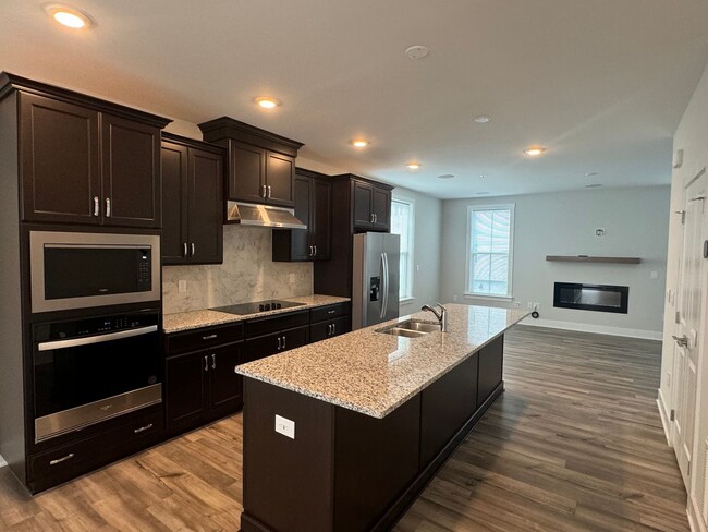 Building Photo - BRAND NEW - 3 Bed | 2.5 Bath End Unit Town...